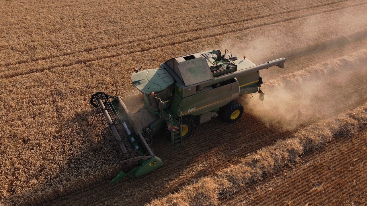 Combine Harvester in farm field